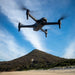 Aeroo Pro Drone flying in the sky with landscape in background