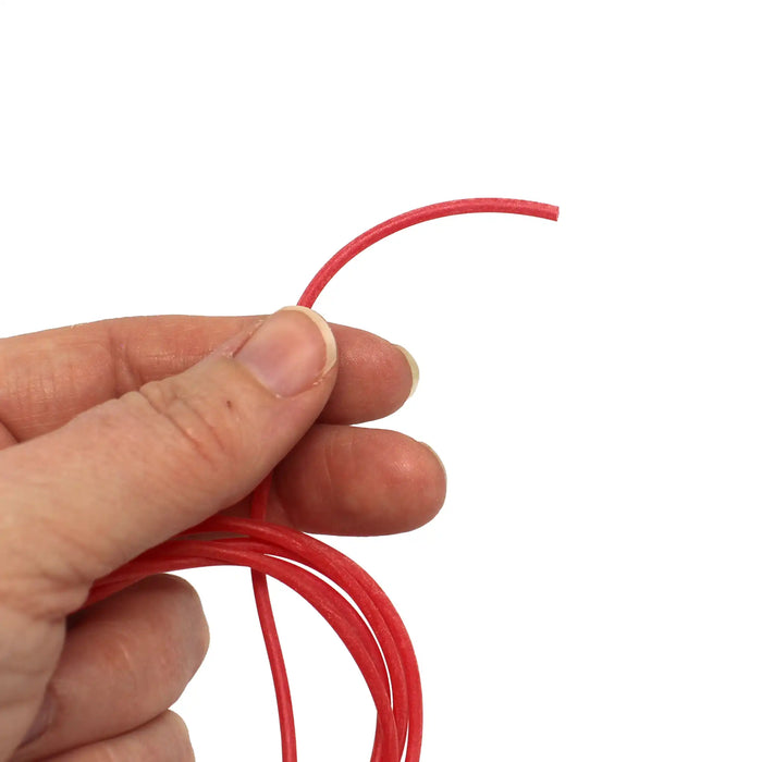 Gemini Genie 1mm durable silicone rig tubing in 1 metre lengths held in hand