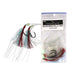 A packaged fishing jig labeled 'Bleeding Pilly Rig' shown next to the same jig unpackaged on a white background. The jig has dark hooks with red and light blue feather strands and pale green beads.