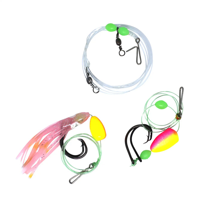 Three fishing jig lures with hooks, clear line, and bright green beads arranged on a plain white background.