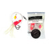 A Snapper Gurnard fishing jig rig set shown next to its retail packaging. The product features a bright pink/red topwater jig with a yellow and orange bubble, a white skirt, and a black treble hook.