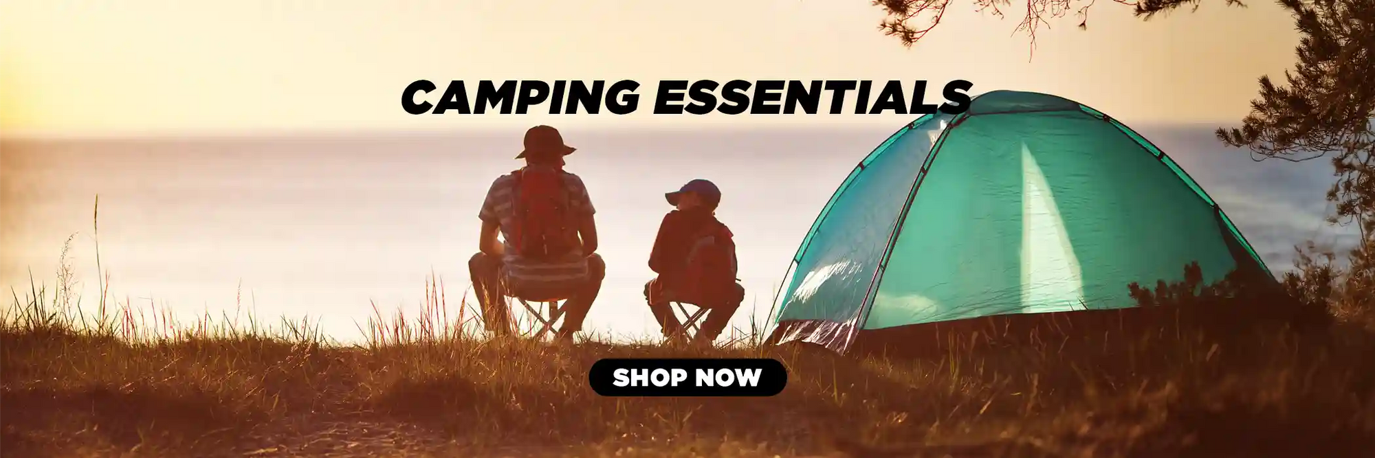 Father and son camping with outdoor gear